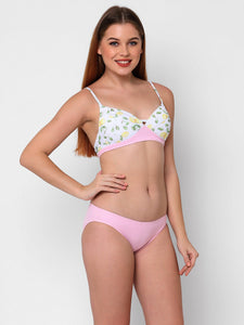 woman wearing Esha Lal Swimwear lemon print two piece bikini set