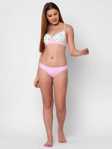 woman wearing Esha Lal Swimwear lemon print two piece bikini set